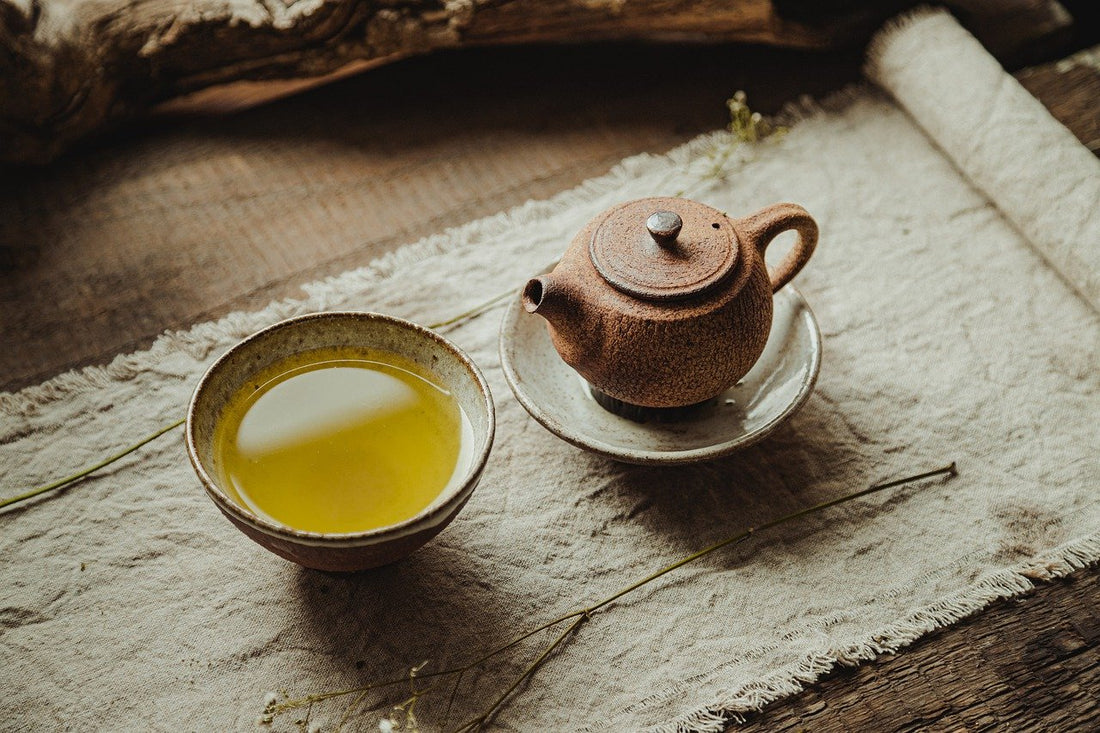Huang Shang Yellow Tea offered in a ceramic tea set